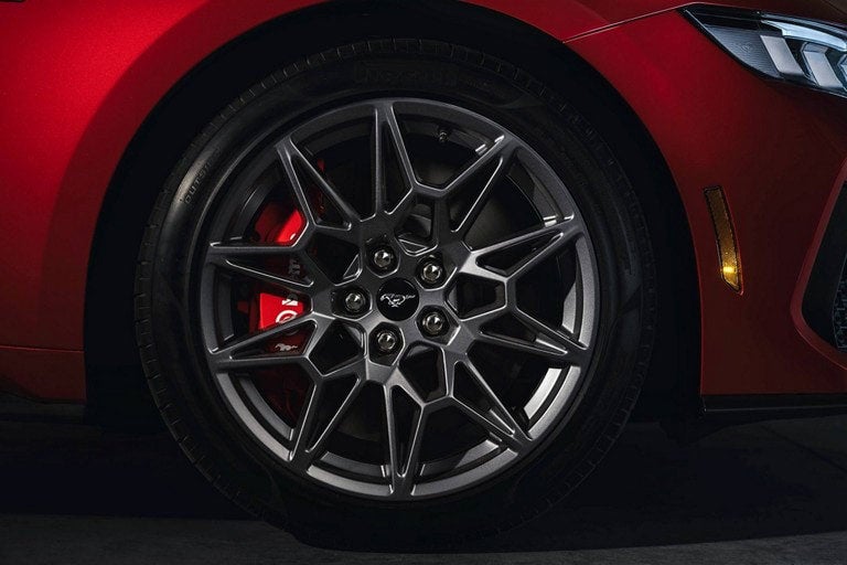 2024 Ford Mustang® model with a close-up of a wheel and brake caliper | Midland Ford in Midland MI